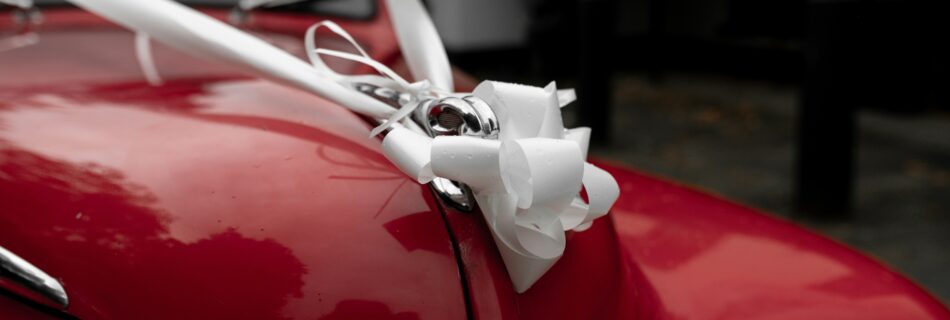 red rolls royce packed in ribbon cover image of an anonymous letter of safar-e-adab